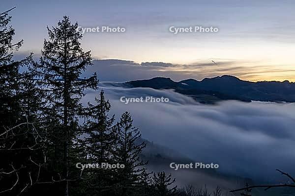 Fog flow, high fog flows over Unteren Hauenstein Pass into the Basel area, long exposure, Wisenberg, Baselland, Switzerland [IBR123769694]
