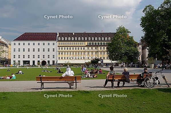 Benches in a meadow behind Marienplatz, city hall, Munich, city center, big city, Bavaria, Germany [IBR112941797]