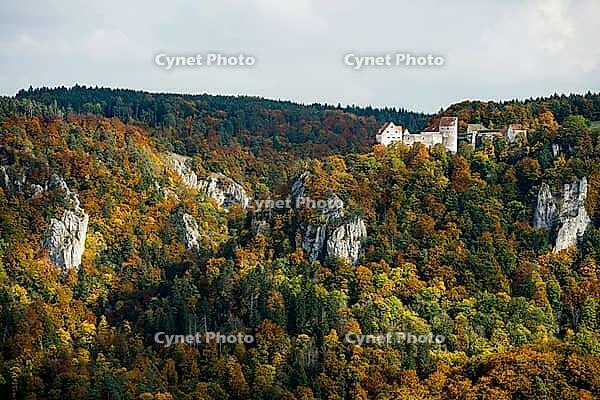 Autumnal forest and Wildenstein Castle, Rauher Stein viewpoint, near Leibertingen, Upper Danube nature park Park, Upper Danube Valley, Danube, Swabian Jura, Baden-Württemberg, Germany [IBR123911543]