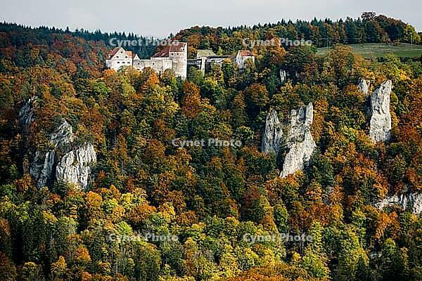 Autumnal forest and Wildenstein Castle, Rauher Stein viewpoint, near Leibertingen, Upper Danube nature park Park, Upper Danube Valley, Danube, Swabian Jura, Baden-Württemberg, Germany [IBR123911544]
