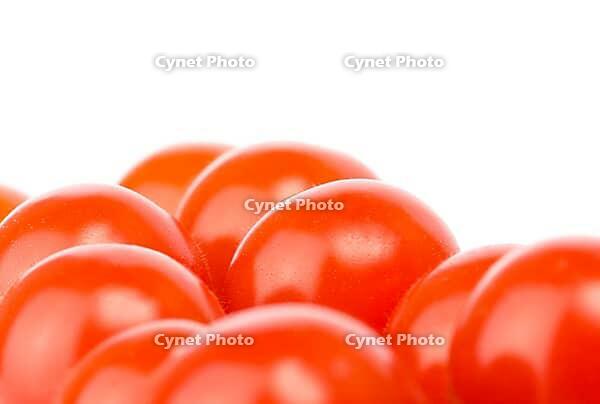 Cherry tomatoes on the white [IBR123980359]