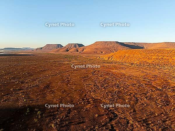 Aerial view, arid desert landscape, hills in Damaraland, Namibia [IBR123990976]