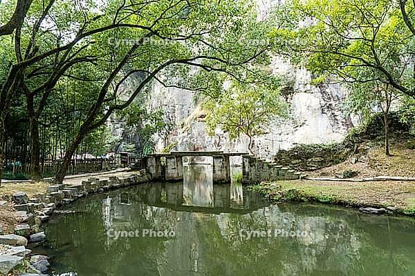 The East Lake in Shaoxing City, Zhejiang Province, China, featuring beautiful mountains, clear waters, and distinctive wooden boats, is a national AAAA-level tourist attraction [IBR123990998]