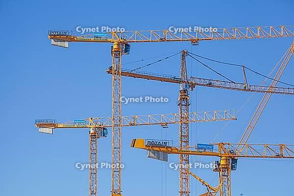 Construction cranes in the Überseestadt of Bremen, scaffolding, construction site, Bremen [IBR123999822]