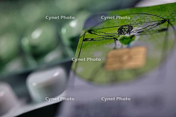 Electronic health card, health insurance card with tablets, medicine, close-up, studio shot, Germany [IBR123999887]