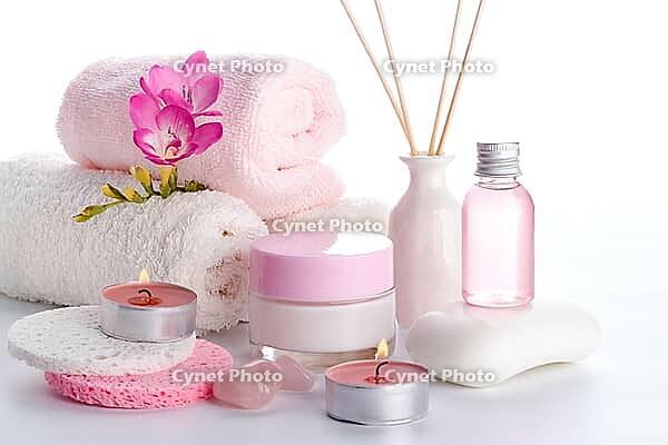 Spa setting and health care items, body lotion, soap, aroma sticks, oil, sponges and towels [IBR123999894]