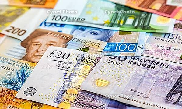 Background from banknotes of various currencies, money background. Business concept of worldwide currencies [IBR124036425]