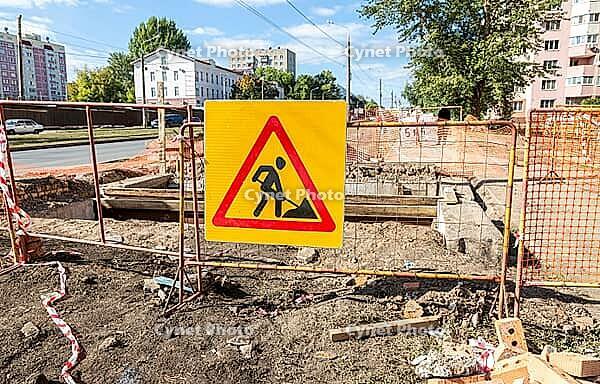 Road works traffic sign at the city street. Road under construction [IBR124036443]