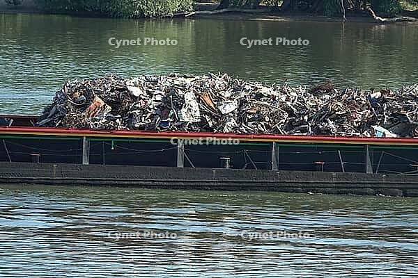Cargo ship with scrap metal [IBR124051695]