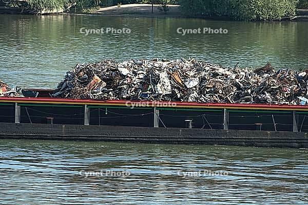 Cargo ship with scrap metal [IBR124051698]