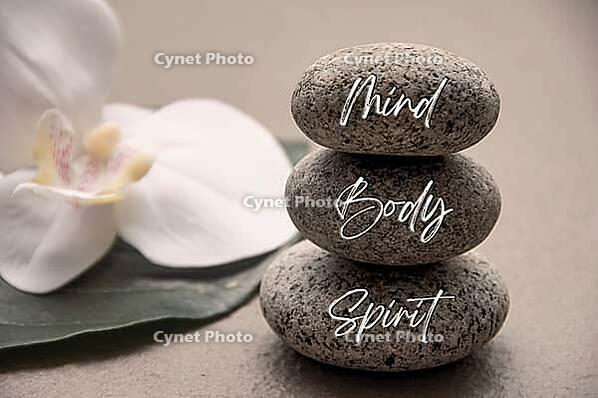 Mind, Body and Soul words engraved on zen stones with space for text. Health life concept [IBR124083668]