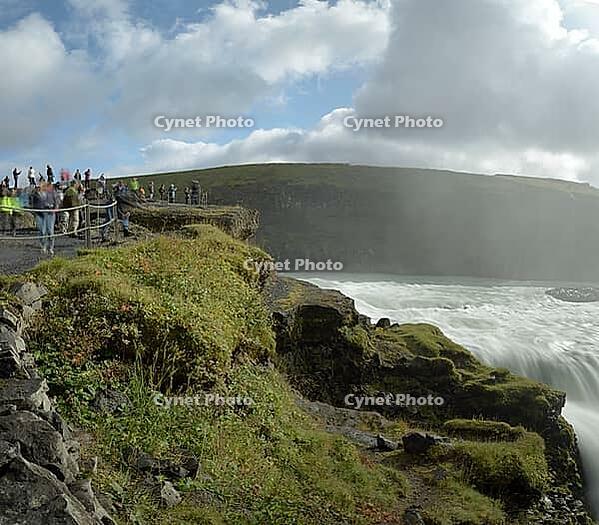 Tourists at Gullfoss waterfall, panoramic picture, Iceland [IBR124192731]