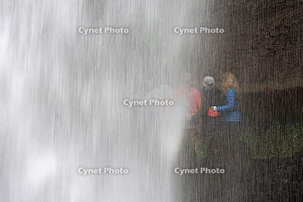 Tourists at Kvernufoss Waterfall, Skogafoss, South Iceland, Iceland [IBR124192740]
