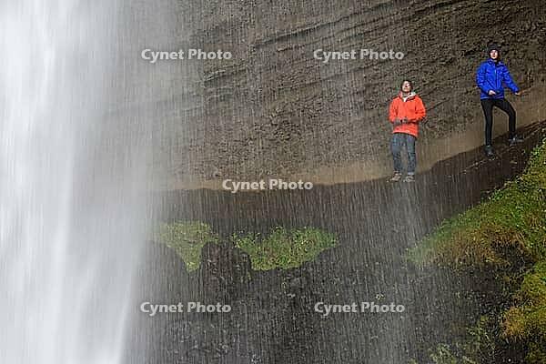 Tourists at Kvernufoss Waterfall, Skogafoss, South Iceland, Iceland [IBR124192757]