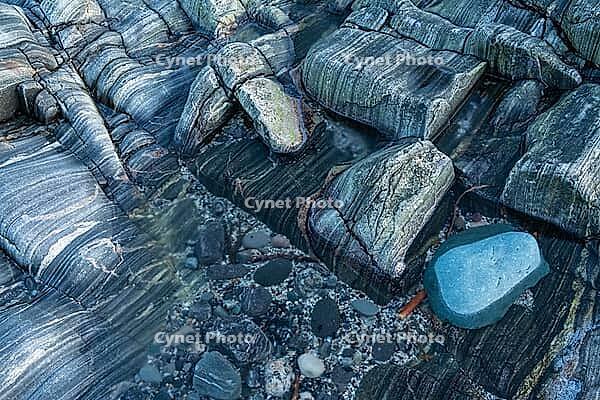 Rock structures on the coast, Söröya, Finnmark, Norway, February 2019 [IBR124200481]