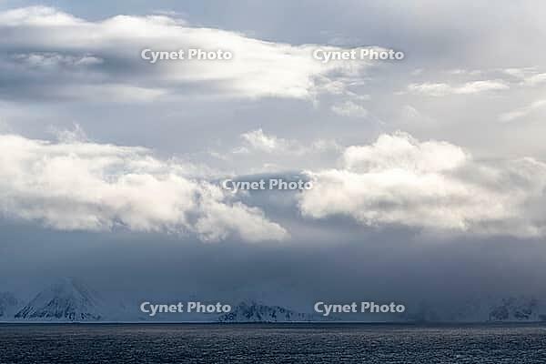 Dramatic lighting over the Norwegian European Sea, Söröya, Finnmark, Norway, March 2019 [IBR124200491]