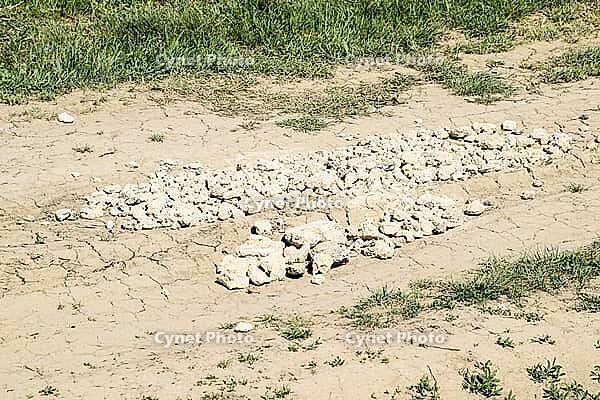 Pits on the road are filled with stones. Quarry stone [IBR124200558]