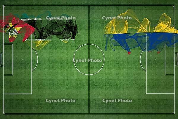 Mozambique vs Colombia Soccer Match, national colors, national flags, soccer field, football game, Competition concept, Copy space [IBR124240931]