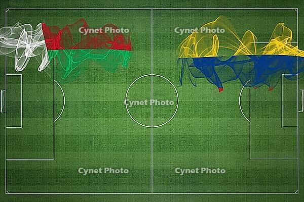 Madagascar vs Colombia Soccer Match, national colors, national flags, soccer field, football game, Competition concept, Copy space [IBR124240983]