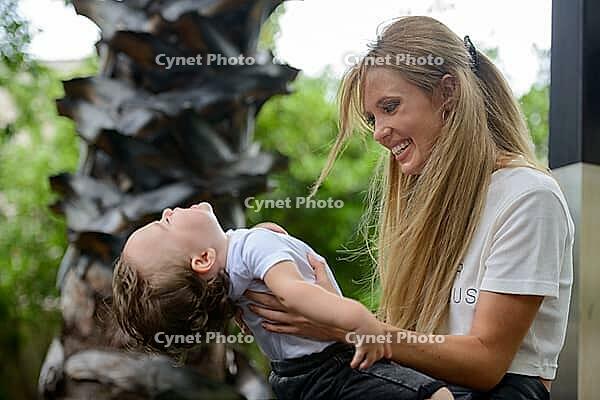 Portrait of young beautiful blonde mother with adorable young baby son together [IBR124309012]