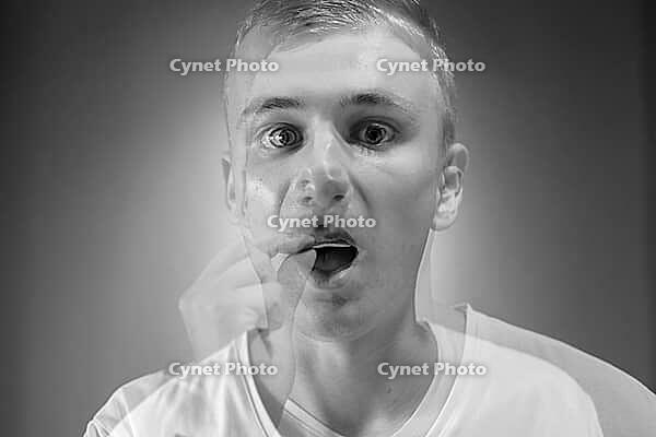 Portrait of young man with double exposure effect in black and white [IBR124309046]