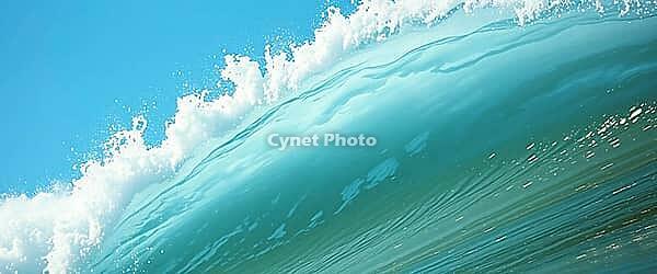 Greenish colored wave with impressive size and natural water flow, blue water and wave background, AI generated [IBR124458858]