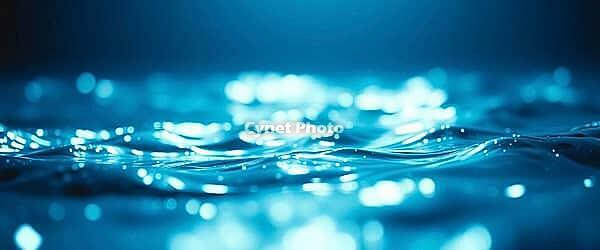 Tranquil nighttime scene with soft sparkling waves and calming water, blue water and waves background, AI generated [IBR124458896]