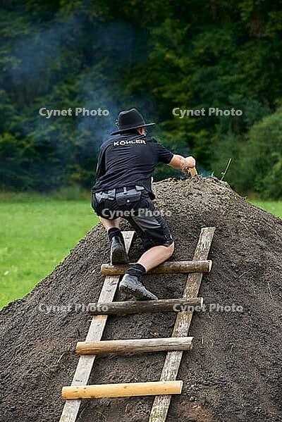 Charcoal campaign in the Hohenloher open-air museum, Wackershofen, Schwäbisch Hall-Wackershofen, coal kiln, coal kiln. Fire, Hohenlohe, Germany [IBR124469128]