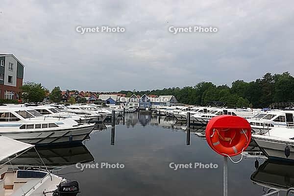 Charter boats and holiday homes in Marina Wolfsbruch, Rheinsberg, Brandenburg, Germany [IBR124494819]