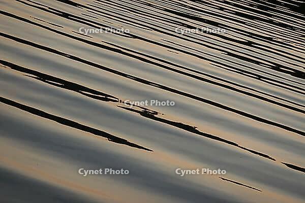 Light reflection on light waves form an abstract pattern, Rheinsberg, Brandenburg, Germany [IBR124494845]