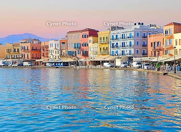 Venetian habour of Chania with historical houses at sunny day, Crete, Greece [IBR124497466]