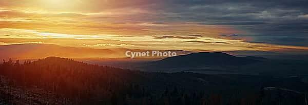 Sunset with dramatic cloudy sky over mountains shape, beautiful nature landscape [IBR124497479]