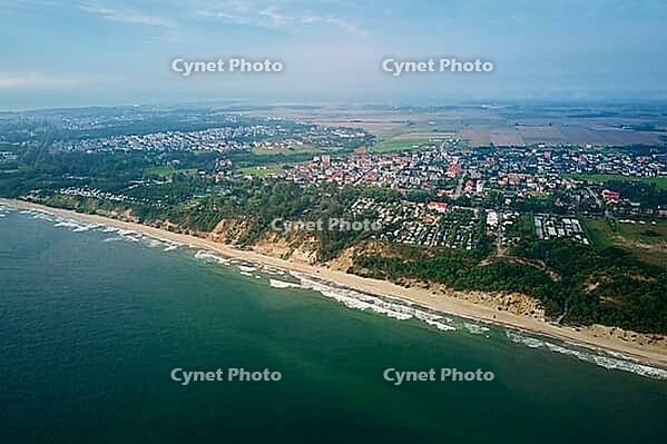 Aerial view of sea landscape with sand beach in Wladyslawowo. Baltic sea coastline in Poland. Resort town in summer season [IBR124497485]