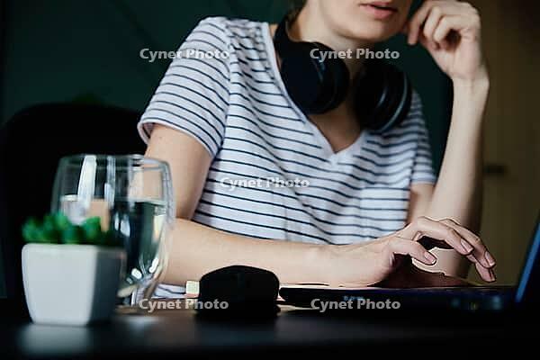Caucasian woman working with laptop at home office workplace. Freelancer remote work [IBR124497491]