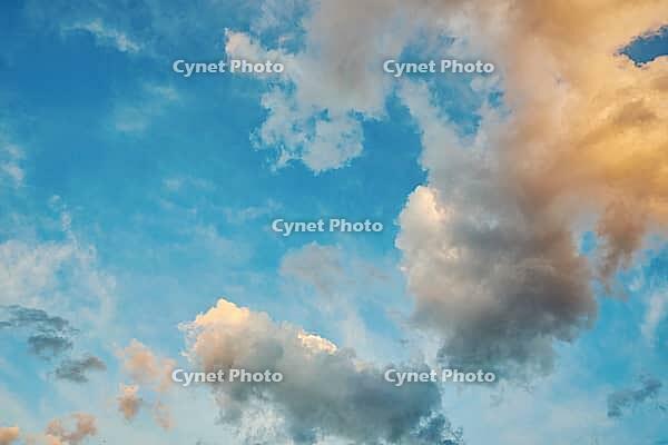White cumulus clouds in blue sky, beautiful cloudscape background [IBR124497511]