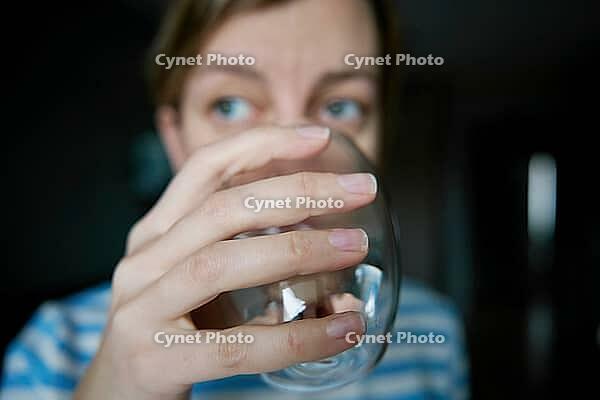 Woman drinks water, Close-up shot of woman drinking fresh clean water from glass, Quenching thirst, Lifestyle healthcare concept [IBR124497513]