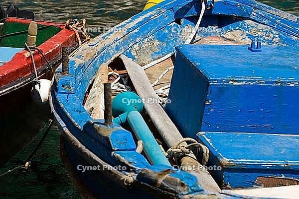 Fishing kaykis in Armeni the port of Oia, Cyclades, Oia, Santorini, Greece [IBR124525355]