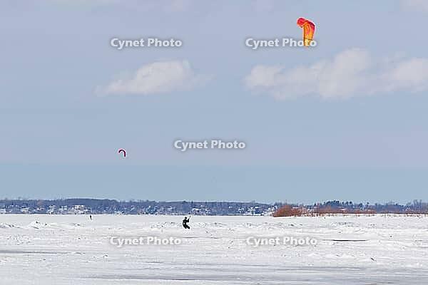 Winter, snowkiting on a frozen river, Province of Quebec, Canada [IBR124525431]