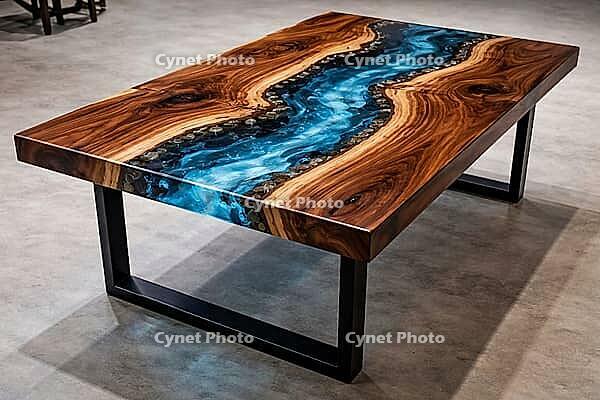 Wooden table with blue epoxy resin flow and sturdy black legs, DIY, hobby epoxy resin casting, colorful resin table, AI generated [IBR124550779]