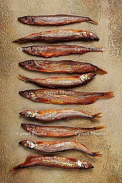 Cold smoked capelin, on the table, top view, no people [IBR124552173]