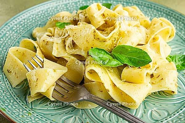 Pasta papardelle, with pesto and parmesan cheese, homemade, no people [IBR124552188]