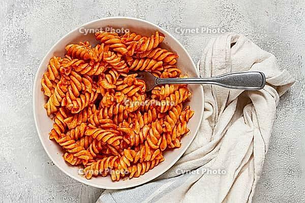 Fusilli pasta dish, made with tomato sauce, homemade, no people [IBR124552197]