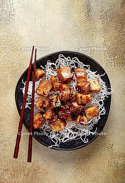 Fried eggplant, with funchosa noodles, with teriyaki sauce and sesame seeds, homemade, no people [IBR124552202]
