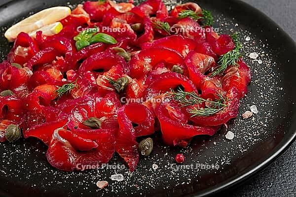 Salmon gravlax with beetroot, Scandinavian snack, beet gravlax, lightly salted fish, homemade, no people [IBR124552214]