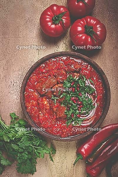 Chashushuli, a traditional Georgian dish, spicy, stewed meat with tomatoes and spices, homemade, no people [IBR124552222]