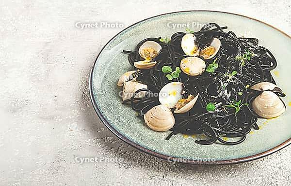 Black spaghetti vongole, venerki, homemade, without people [IBR124552256]
