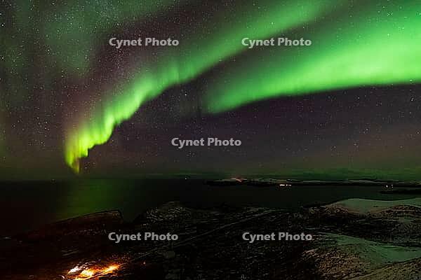 Northern Lights (Aurora borealis) over the Norwegian Sea, S$00F6r$00F6ya, Finnmark, Norway, December 2018 [IBR124563527]