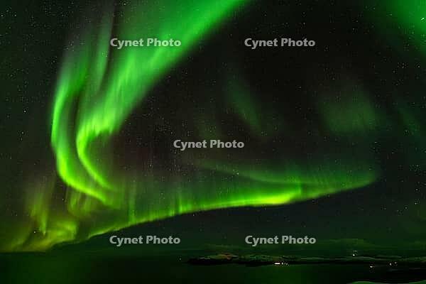 Northern Lights (Aurora borealis) over the Norwegian Sea, S$00F6r$00F6ya, Finnmark, Norway, December 2018 [IBR124563539]