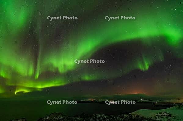 Northern Lights (Aurora borealis) over the Norwegian Sea, S$00F6r$00F6ya, Finnmark, Norway, December 2018 [IBR124563542]