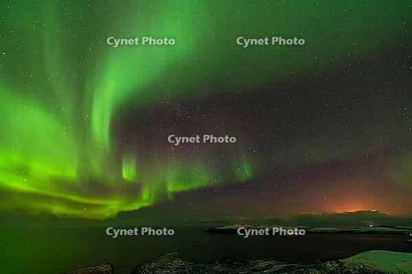 Northern Lights (Aurora borealis) over the Norwegian Sea, S$00F6r$00F6ya, Finnmark, Norway, December 2018 [IBR124563543]